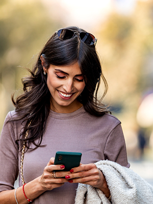 woman looking at her phone