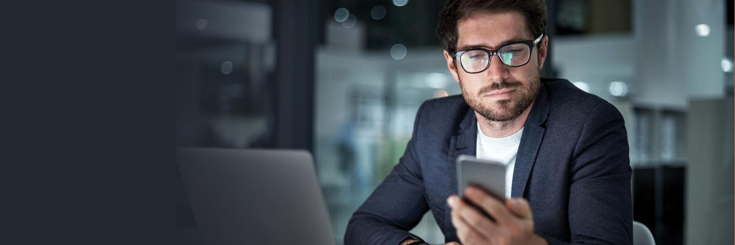 man looking at his phone