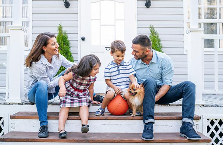 Picture of a family sitting on the porch