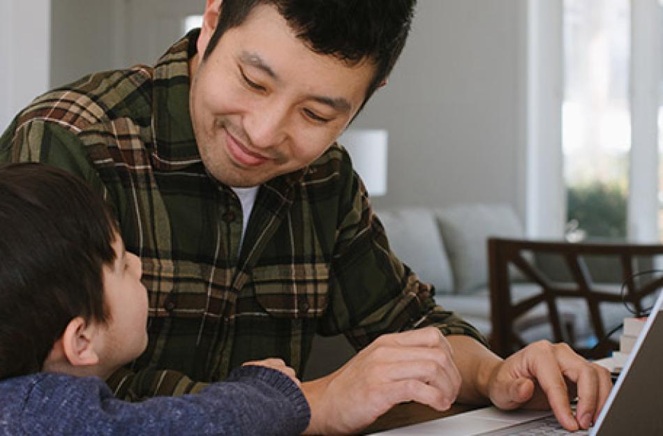 man and child learning