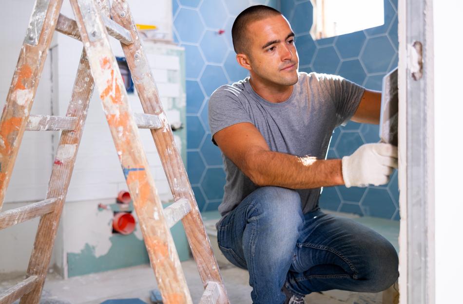 A man remodeling his home