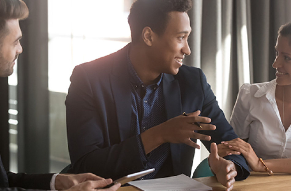 man and woman talking with a financial advisor