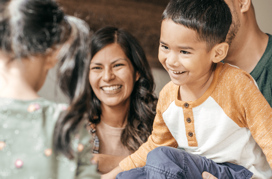 family laughing and smiling